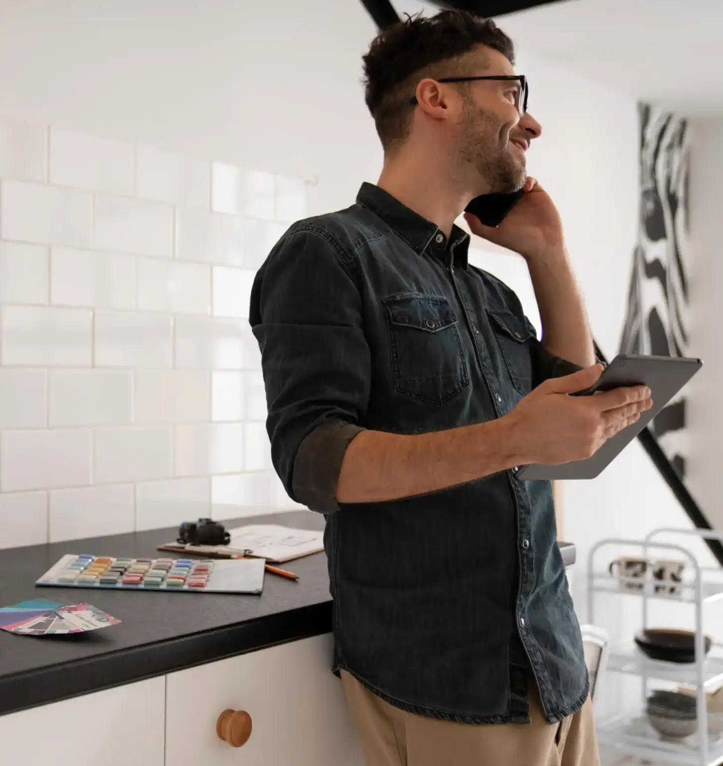 The Kitchen Remodel Contractor calling on the phone with the client